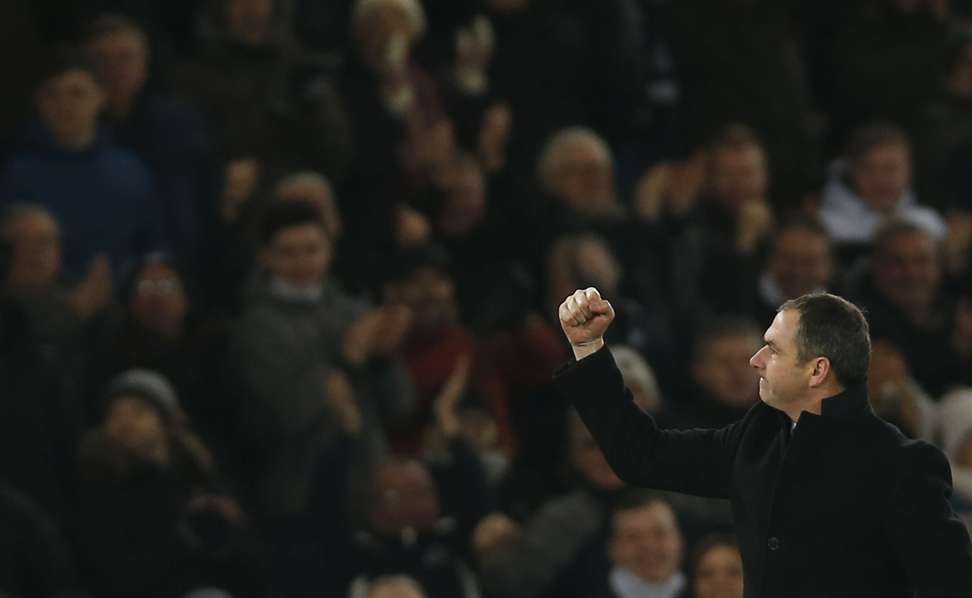 Swansea City manager Paul Clement celebrates after the match. Photo: Reuters
