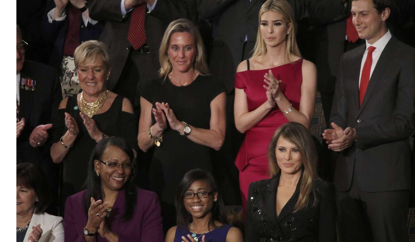 US first lady Melania Trump. Ivanka Trump and Jared Kushner applaud behind her. Photo: Reuters