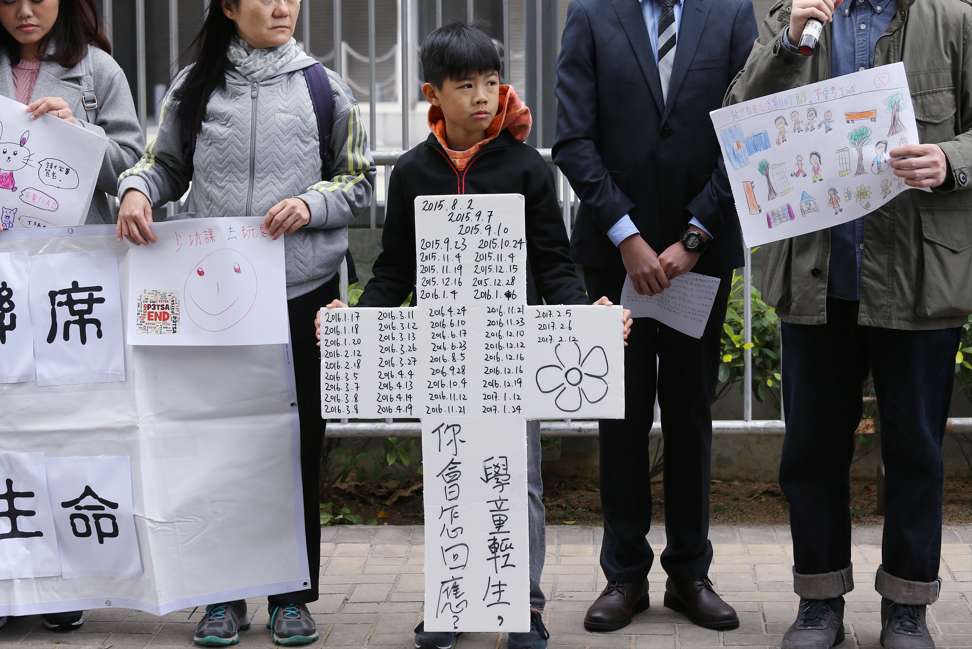 Members of a suicide prevention committee call for a high-level government task force to tackle the issue, at a gathering outside the Central Government Offices last month. Photo: Dickson Lee