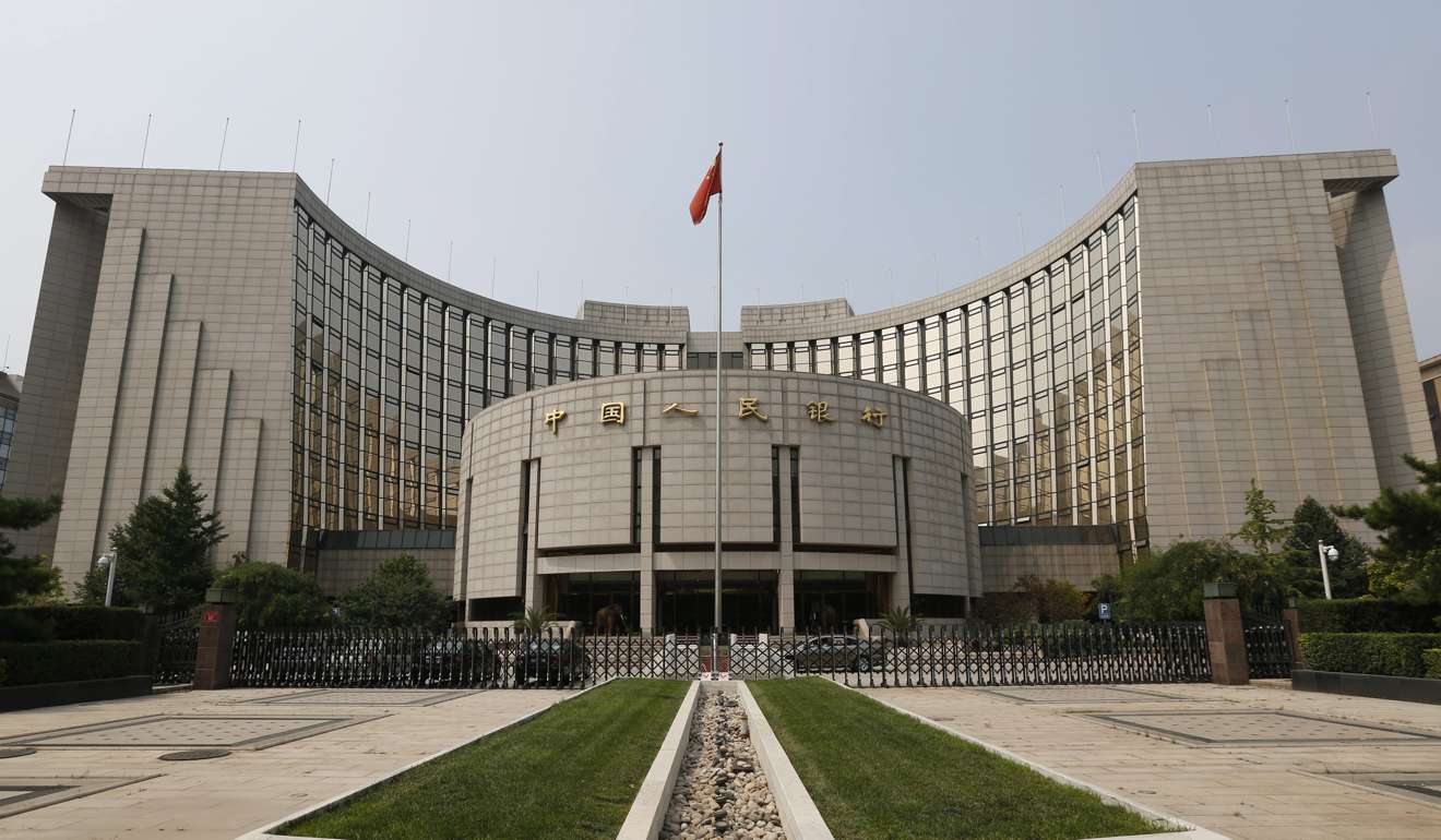 Net interest margins at Chinese banks - the difference between the interest banks receive on loans and the interest they give to depositors - have shrunk after the People’s Bank of China cut interest rates in early 2016 to stimulate economic growth. Photo: EPA