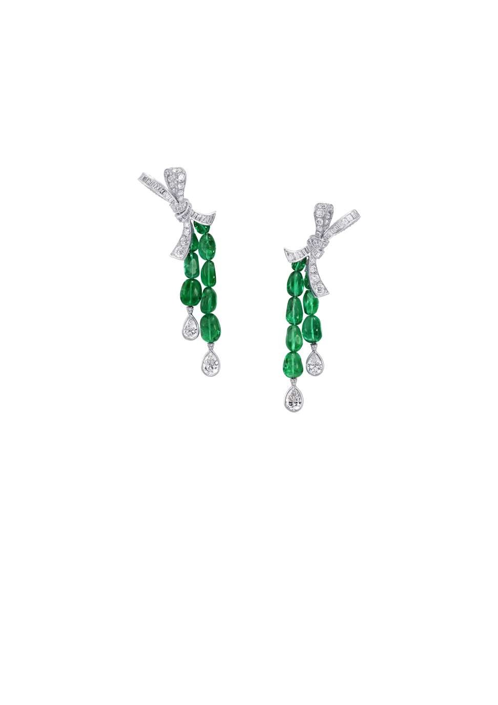 As part of the bow collection, this pair of multishape emerald and diamond earrings twinkles with green light as you move