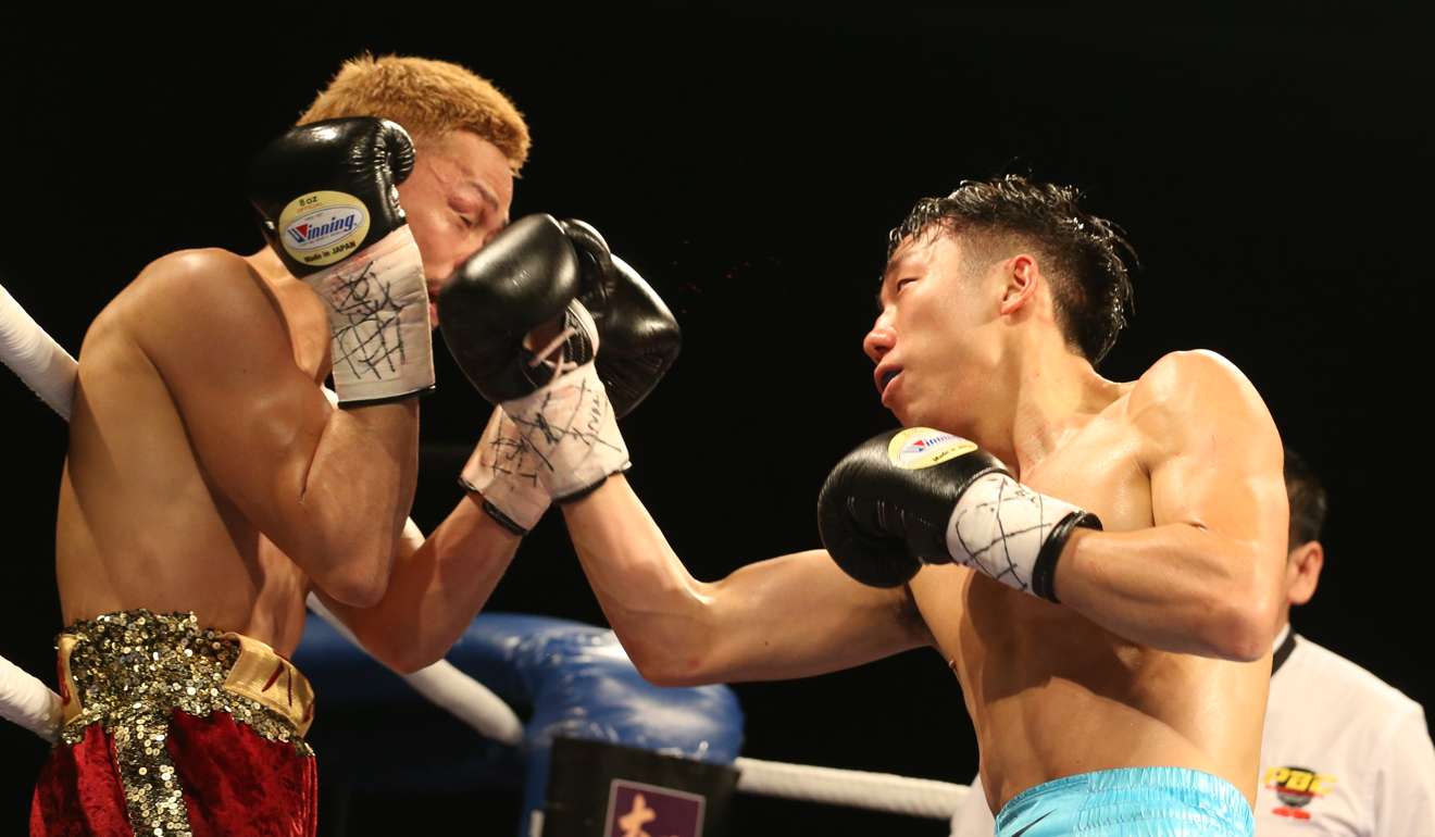 Rex Tso has Hirofumi Mukai against the ropes in the eighth round. Photo: Felix Wong