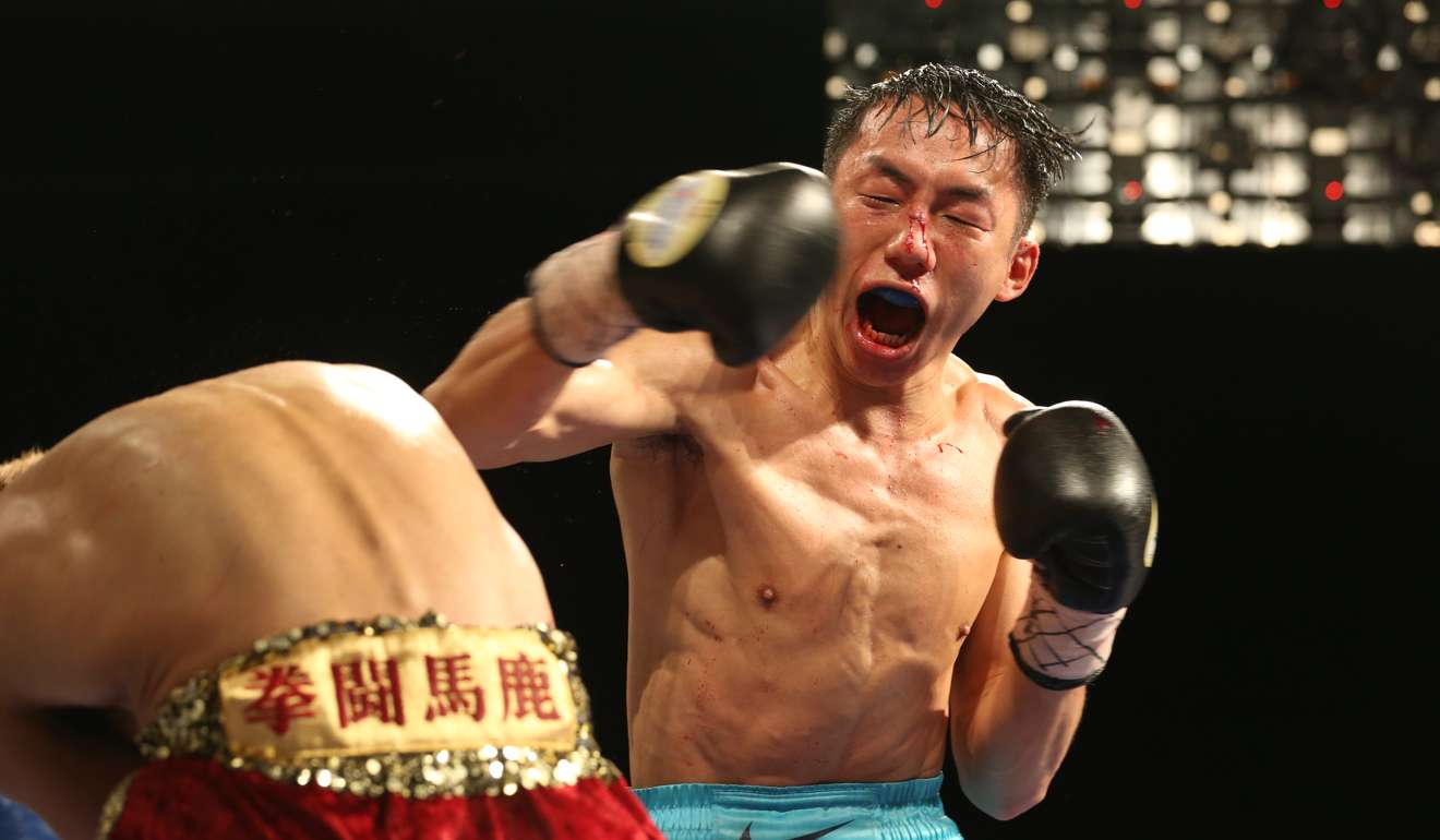 Rex Tso is on the offensive against Hirofumi Mukai. Photo: Felix Wong
