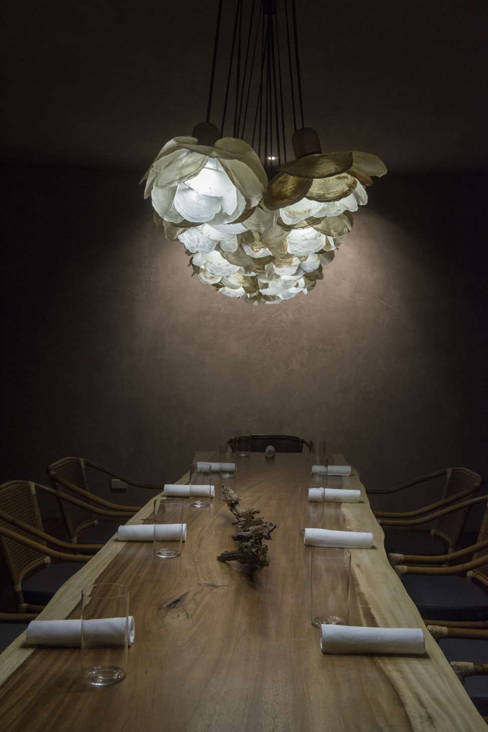 The dining room table at industrial-chic Toyo. Photo: George Tapan