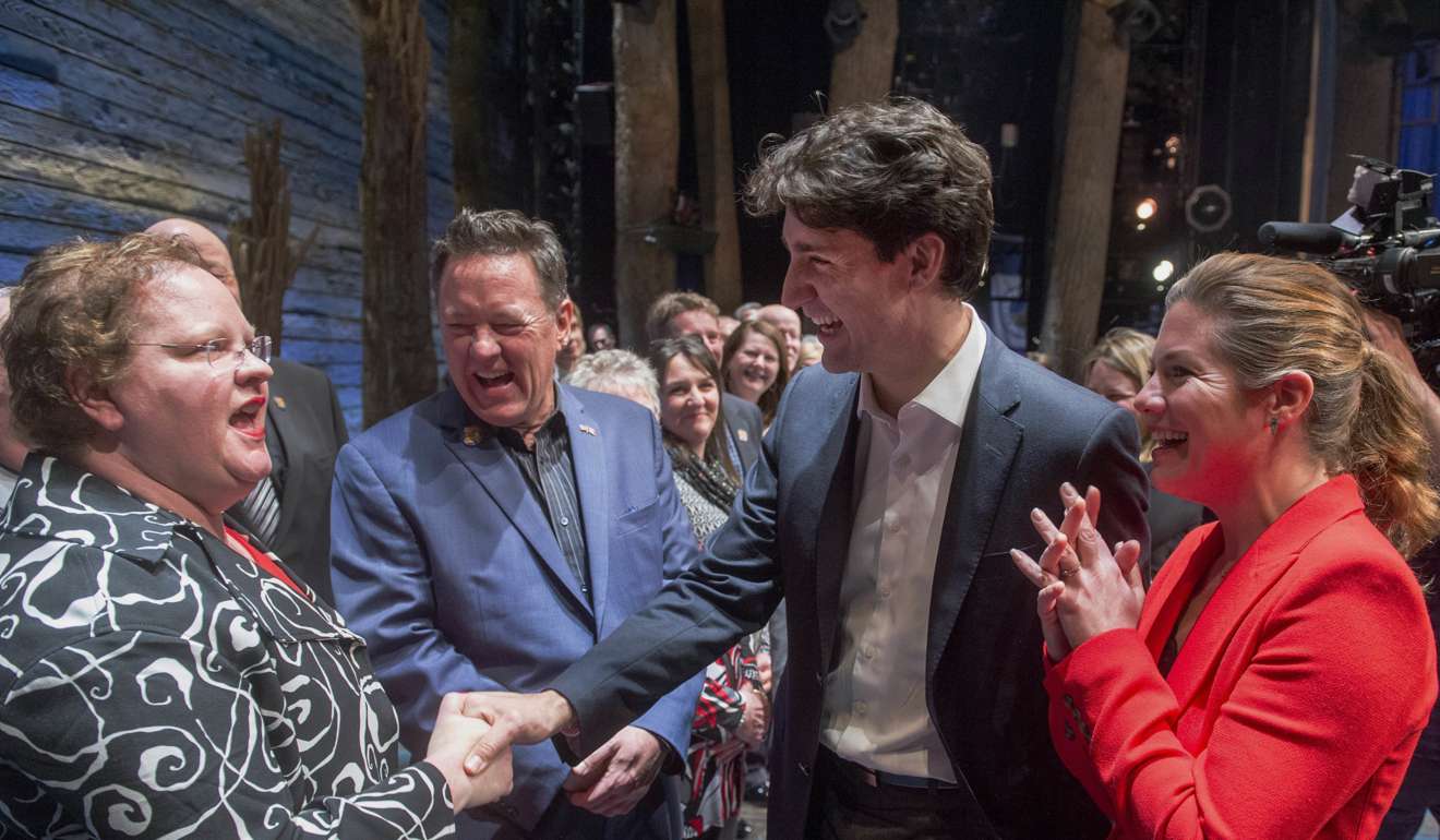 Canadian Prime Minister Justin Trudeau (centre right) and his wife Sophie Gregoire Trudeau (right), chat with some of the citizens of Gander, Newfoundland, after the Broadway musical Come From Away in New York on Wednesday. Photo: AP