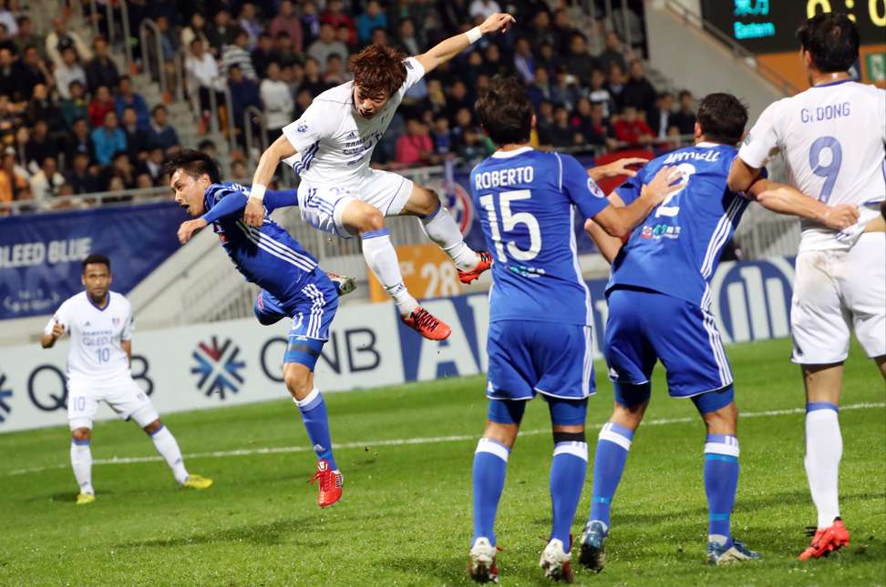 Wong Tsz-ho (second left) in action against Suwon Bluewings in the AFC Champions League. Photo: Nora Team