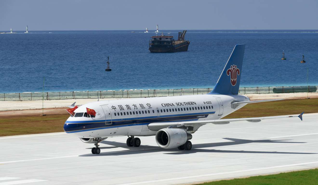 A passenger jet of China Southern Airlines lands on the airport on Meiji Reef in the South China Sea. Photo: Xinhua