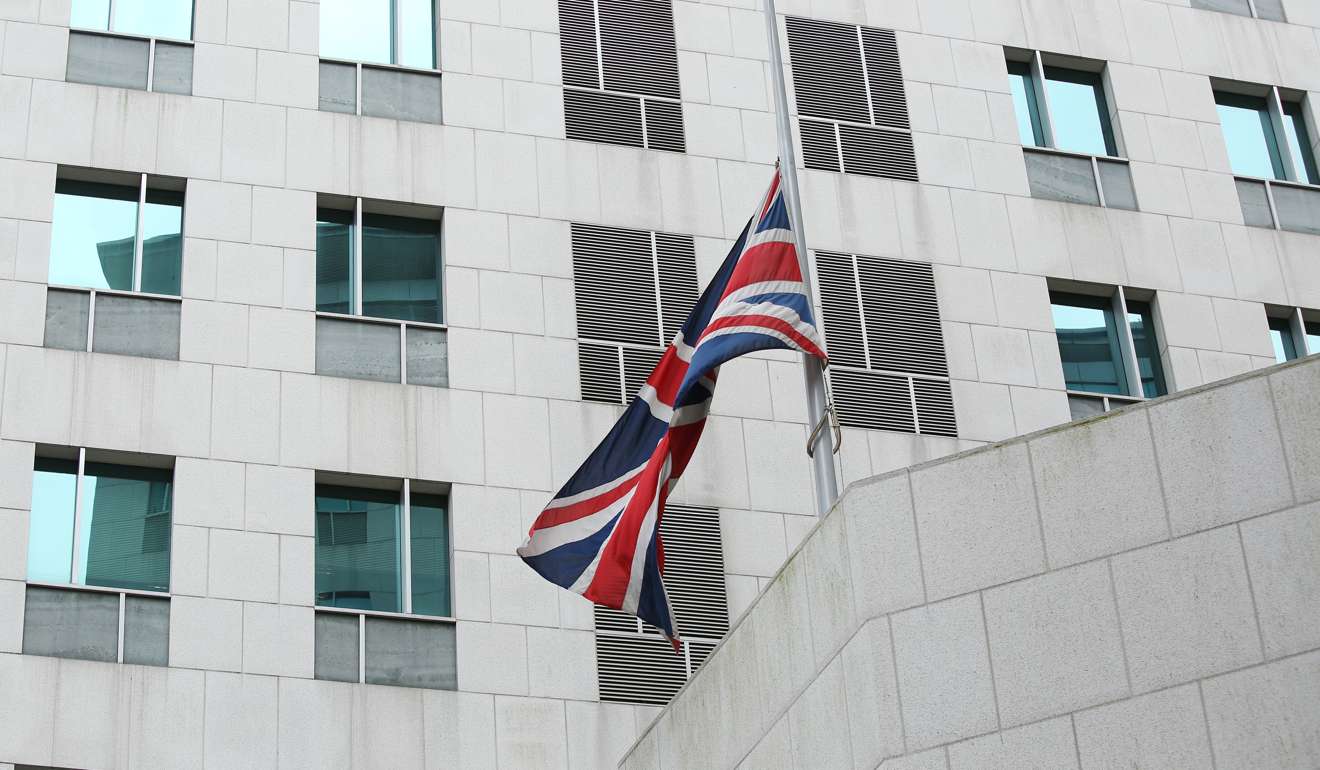 The British flag flies at half mast at the UK consulate in Admiralty. Photo: Edmond So