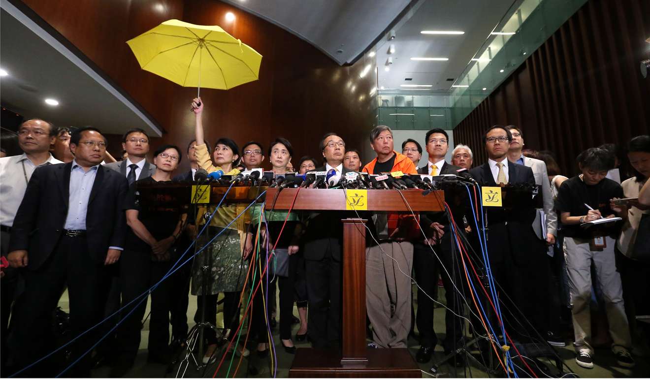Pan-democracy legislators meet the press after rejecting the government’s reform package in a Legislative Council vote in June 2015. Photo: K. Y. Cheng