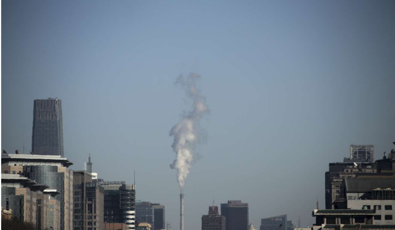 Steam billows from the chimney of a heating plant in Beijing. Photo: Reuters