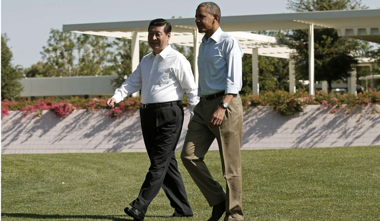 Xi Jinping and Barack Obama walk the grounds of the Annenberg Retreat at Sunnylands in Rancho Mirage, California, in June 2013. Photo: Reuters