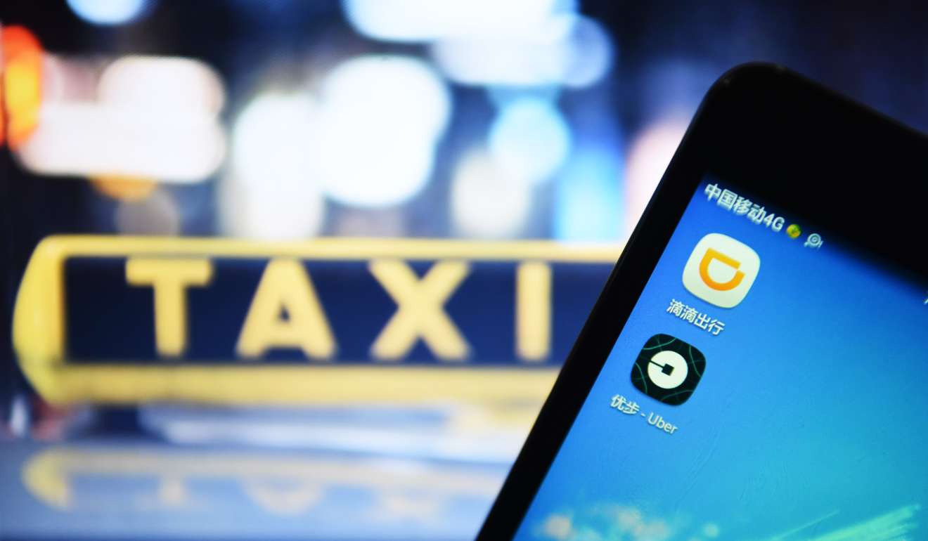 Apps of Didi and Uber on a cellphone of a citizen in Hangzhou. Photo: Xinhua