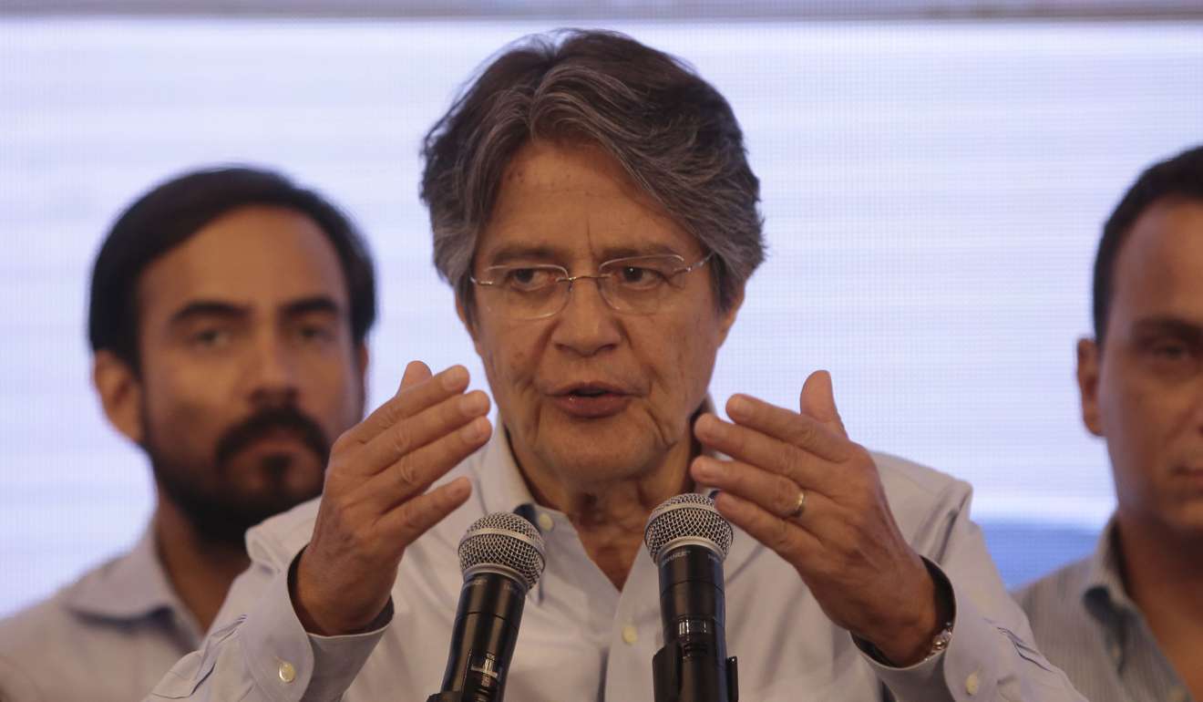 Ecuadorean presidential candidate Guillermo Lasso gives a press conference after the National Election Council's official results show that he lost the runoff election to ruling party candidate Lenin Moreno, in Guayaquil on Sunday. Photo: AFP—