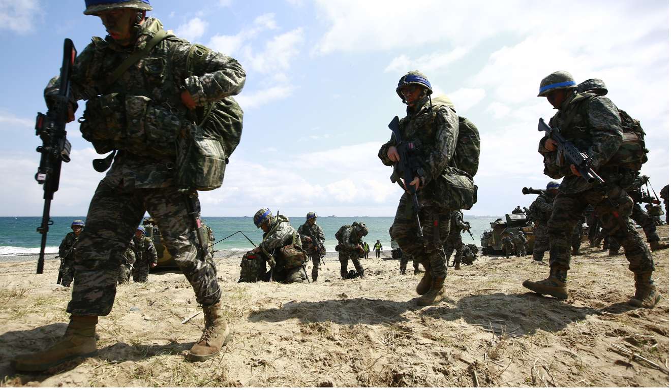 South Korean marines participate in a drill this week in Pohang, South Korea, part of the annual Foal Eagle exercises held jointly with the US military. Washington’s dismissal out of hand of China’s proposal to halt the joint military exercises in exchange for a moratorium on North Korea’s nuclear weapons development was a missed opportunity. Photo: EPA