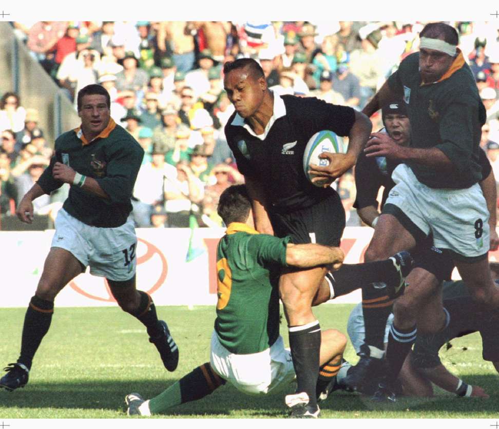 New Zealand winger Jonah Lomu is tackled by South Africa’s Joost Van der Westhuizen during the 1995 Rugby World Cup final. Photo: Reuters