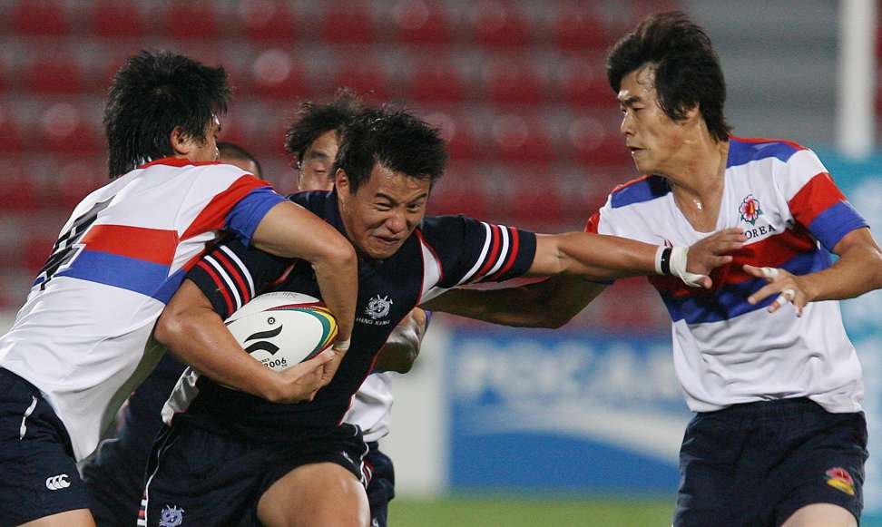 Ricky Cheuk in action in the men’s rugby sevens preliminary round pool match against South Korea in 2006. Photo: Felix Wong