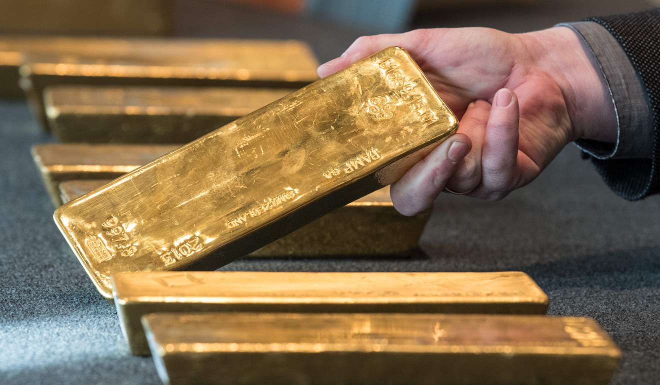 Gold prices hit a 5-month high of of US$1,288.5 per ounce, up 0.8 per cent. Photo: AFP
