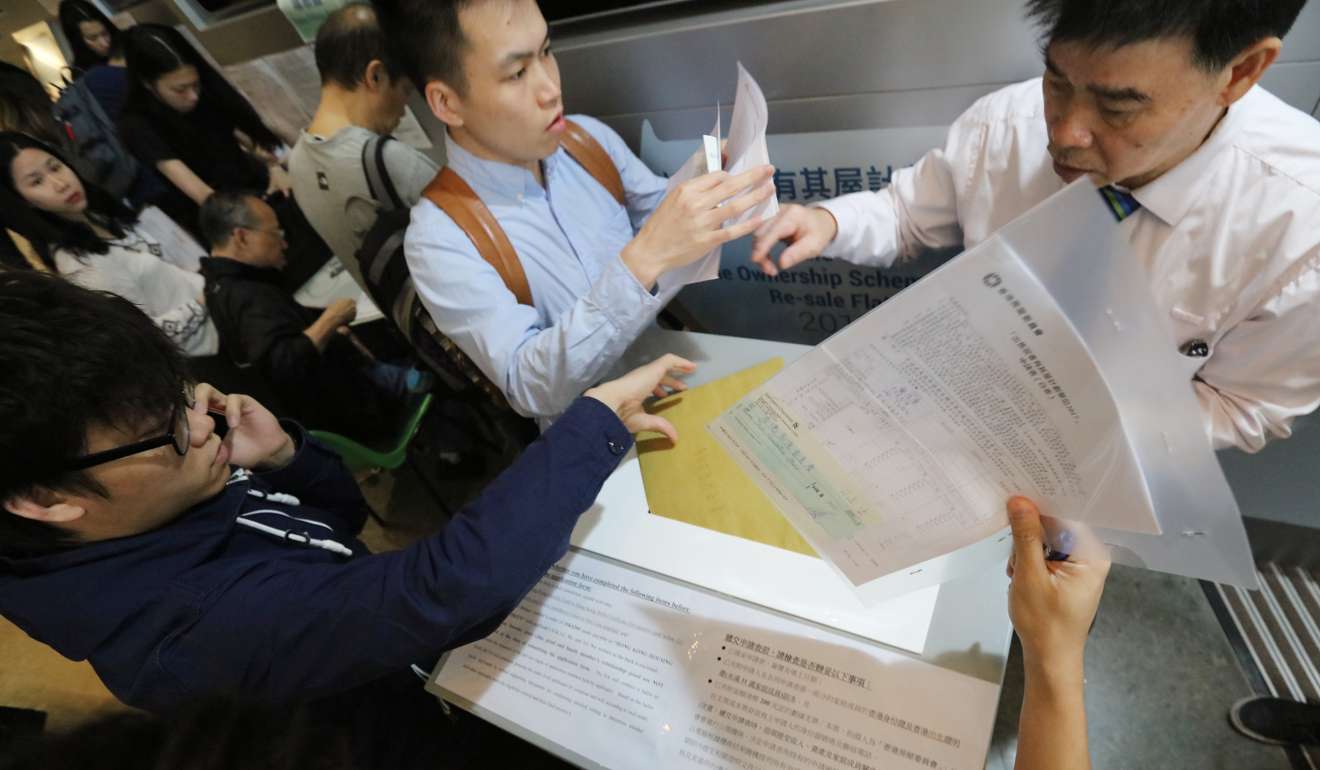 Last day of applications for Housing Authority latest sale of Home Ownership Scheme flats (2,057 flats at three housing estates in Choi Hung and Mui Wo) at HA Customer Service Centre. Photo: Felix Wong