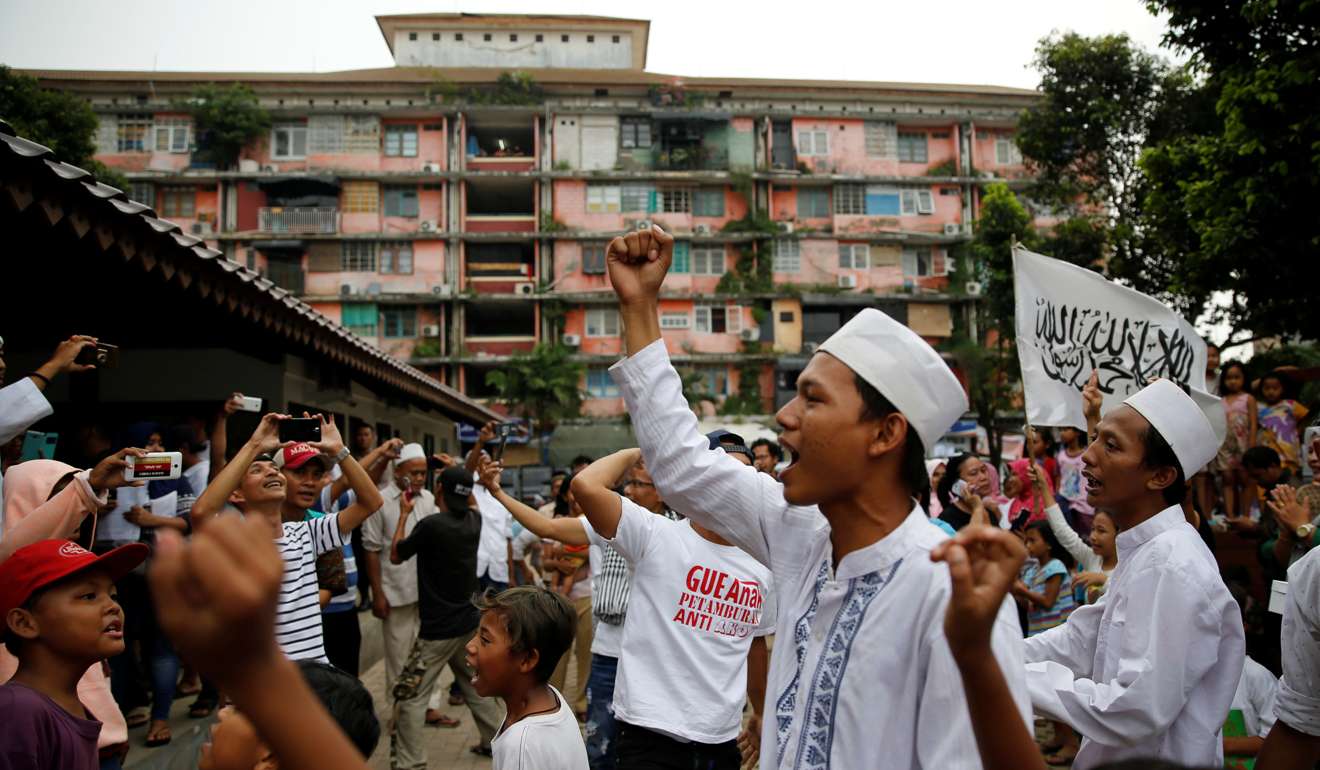 Supporters of Jakarta governor-elect Anies Baswedan. Photo: Reuters