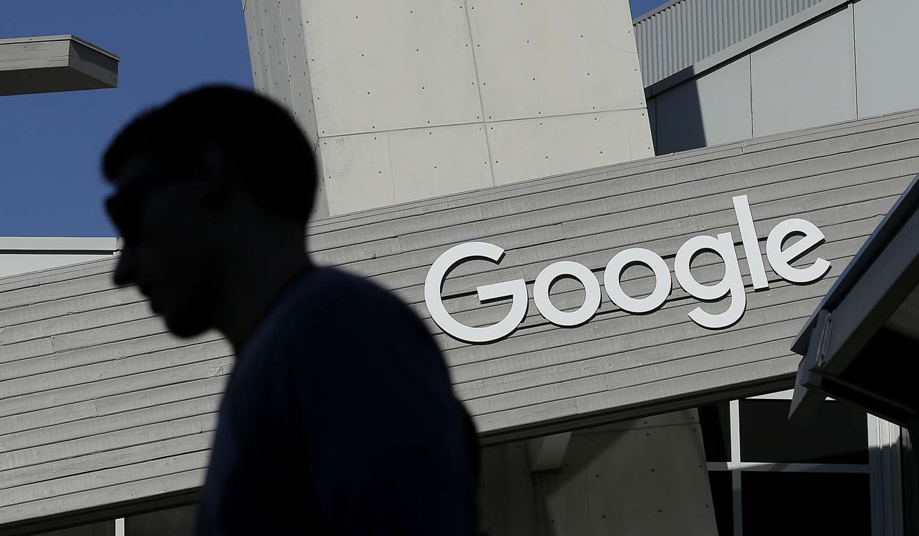 A man walks past a building on the Google campus in Mountain View, California. Google’s home assistant can now learn the voices of six different people. Photo: AP