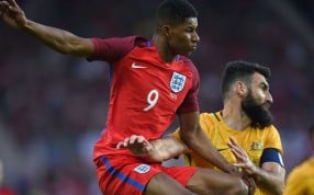 England striker Marcus Rashford marked his debut with a goal against Australia. Photo: AFP England striker Marcus Rashford marked his debut with a goal against Australia. Photo: AFP