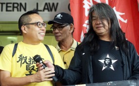 Tam Tak-chi (left) and Leung Kwok-hung outside Eastern Court on Monday. Photos: Dickson Lee