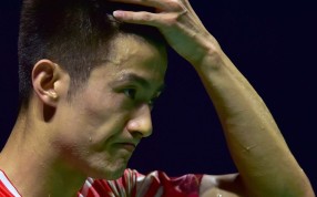 Chen Long of China reacts during the men's singles final against Jan O Jorgensen of Denmark at the China Open badminton tournament in Fuzhou, capital of southeast China's Fujian Province, Nov. 20. Chen Long lost 0-2. (Xinhua/Wei Peiquan)