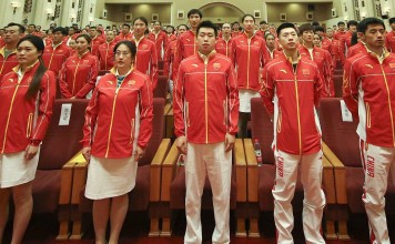 Members of Chinese delegation for Olympic Games attend an official ceremony in Beijing. Photo: Xinhua Members of Chinese delegation for Olympic Games attend an official ceremony in Beijing. Photo: Xinhua