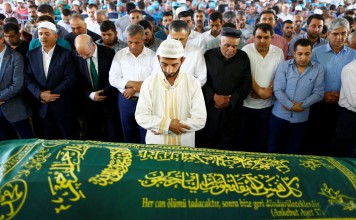 Family members and friends of Kumri Ilter, one of the victims of Saturday's suicide bombing at a wedding, attend her funeral ceremony in southeastern city of Gaziantep, Turkey, on Monday. Photo: Reuters