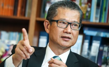 Development minister Paul Chan unveils new housing plans for Kai Tak. Photo: David Wong