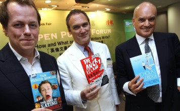 A.A. Gill (centre), flanked by fellow authors Tom Parker Bowles (left) and Nicholas Coleridge at the Hong Kong Book Fair in 2011. Gill has surprised his readers by announcing his cancer diagnosis in his regular restaurant column on the UK Sunday Times. Photo: SCMP Picture