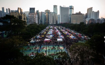 Hong Kong people throng the Victoria Park New Year flower market on January 27, on the eve of the Lunar New Year holiday. Victoria Park already offers a comfortable pedestrian path network and an abundance of sports and recreational facilities. Photo: AFP