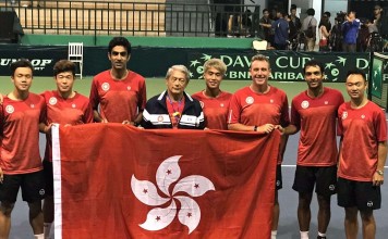 Hong Kong's Davis Cup team celebrates beating Vietnam in February 2017. Left to right) : Andrew Li Hei-yin, Kevin Wong Chun-hun, Majid Khan (physio), Dr David Ho (team manager & physician), Jack Wong Hong-kit, Michael Walker (captain), Karan Rastogi, Yu Hiu-tung (coach).Photo: Hong Kong Tennis Association