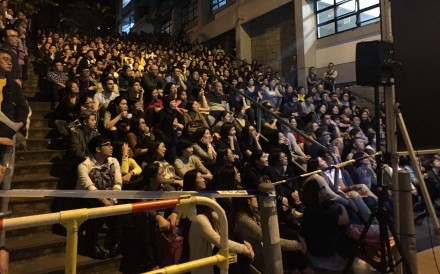 A large crowd gathered to watch the film in Wood Road, Wan Chai. Photo: Facebook/Wan Chai Commons A large crowd gathered to watch the film in Wood Road, Wan Chai. Photo: Facebook/Wan Chai Commons