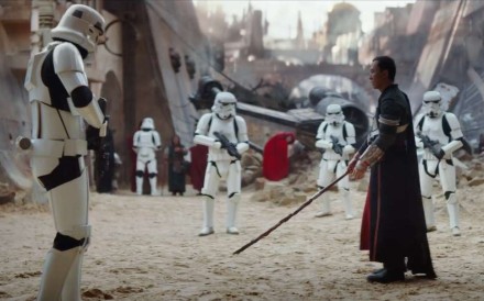 Donnie Yen, armed with nothing more than a stick, prepares to do battle with Imperial stormtroopers in the new trailer for Rogue One. Photo: Disney