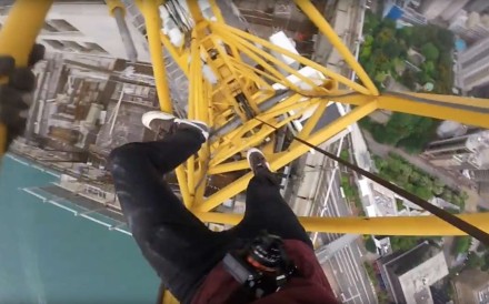 A YouTube screen grab shows a daredevil “rooftopping” the New World Centre in Tsim Sha Tsui, which is being remodelled.