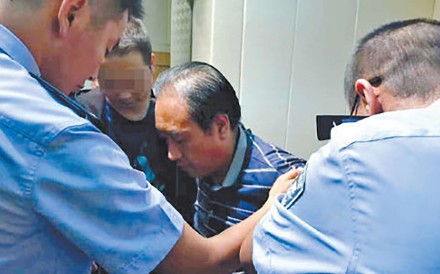 Gao Chengyong pictured during his arrest. Photo: SCMP Pictures