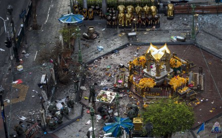 Experts investigate the Erawan shrine at the site of a deadly blast in central Bangkok in 2015. Police in Thailand on Tuesday said they have increased security at major landmarks in the capital Bangkok, at airports and in surrounding provinces following reports of bomb plots. File photo: Reuters