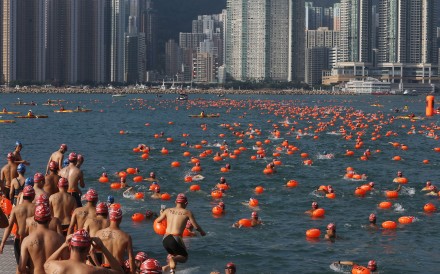About 3,000 swimmers navigated 1.5km from Lei Yue Mun fishing village in Kowloon to Sai Wan Ho on the other side of Victoria Harbour. Photo: Sam Tsang
