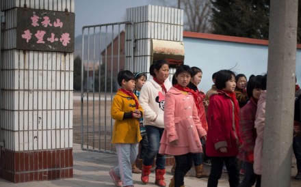 Children leaving a school in Chengde, Hebei province. China has a large gap in educational attainment between males and females. Photo: AFP Children leaving a school in Chengde, Hebei province. China has a large gap in educational attainment between males and females. Photo: AFP