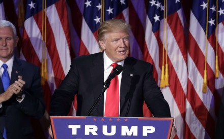 President-elect Donald Trump gives his acceptance speech during his election night rally on Wednesday, to applause from Vice-President-elect Mike Pence. Photo: AP