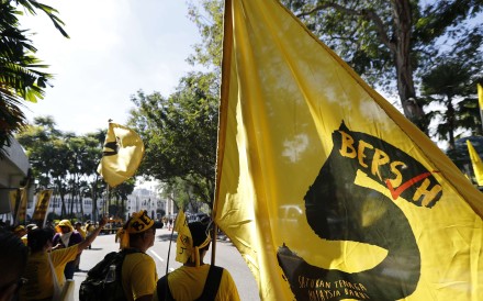 Protesters gathers outside a mosque during the Coalition for Free and Fair Elections (Bersih) rally in Kuala Lumpur. Photo: AP