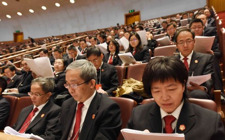 A survey found that 43 per cent of National People’s Congress deputies polled took more than three hours to go through China’s annual budget documents. Photo: Xinhua