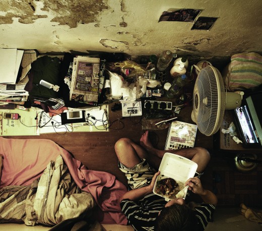 Life in a tiny cubicle that passes for a home in Hong Kong. Photo: Benny Lam