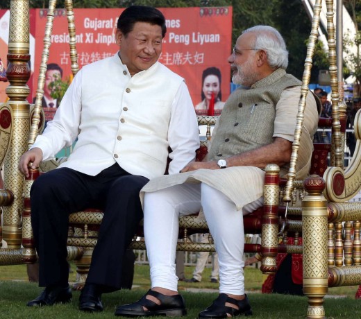 Chinese President Xi Jinping sits on a swing with Indian Prime Minister Narendra Modi at a riverside park in Gujarat in 2014. Photo: Xinhua