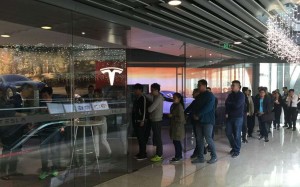 People queue up at Tesla’s Beijing showroom to put in their orders for the Model 3. Photo: SCMP Pictures