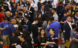 Potential buyers waiting outside sales office during Sun Hung Kai's Ocean Wings for sale at International Commerce Centre in West Kowloon. Photo: Edmond So
