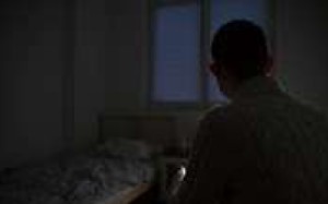 Khaled, originally from Syria and now seeking asylum in Germany, in his room near Berlin. Photo: Raquel Carvalho Khaled, originally from Syria and now seeking asylum in Germany, in his room near Berlin. Photo: Raquel Carvalho