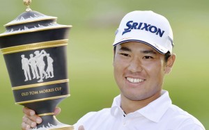 Japan’s Hideki Matsuyama raises the trophy after winning the WGC-HSBC Champions in Shanghai. Photo: Kyodo