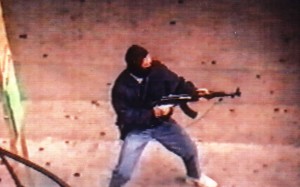 Armed robber Yip Kai-foon using an AK-47 in Hong Kong.